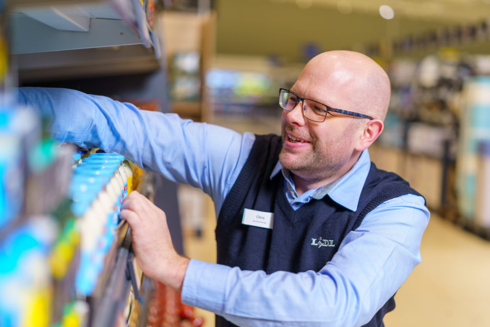 Lidl staff and shelf stacking